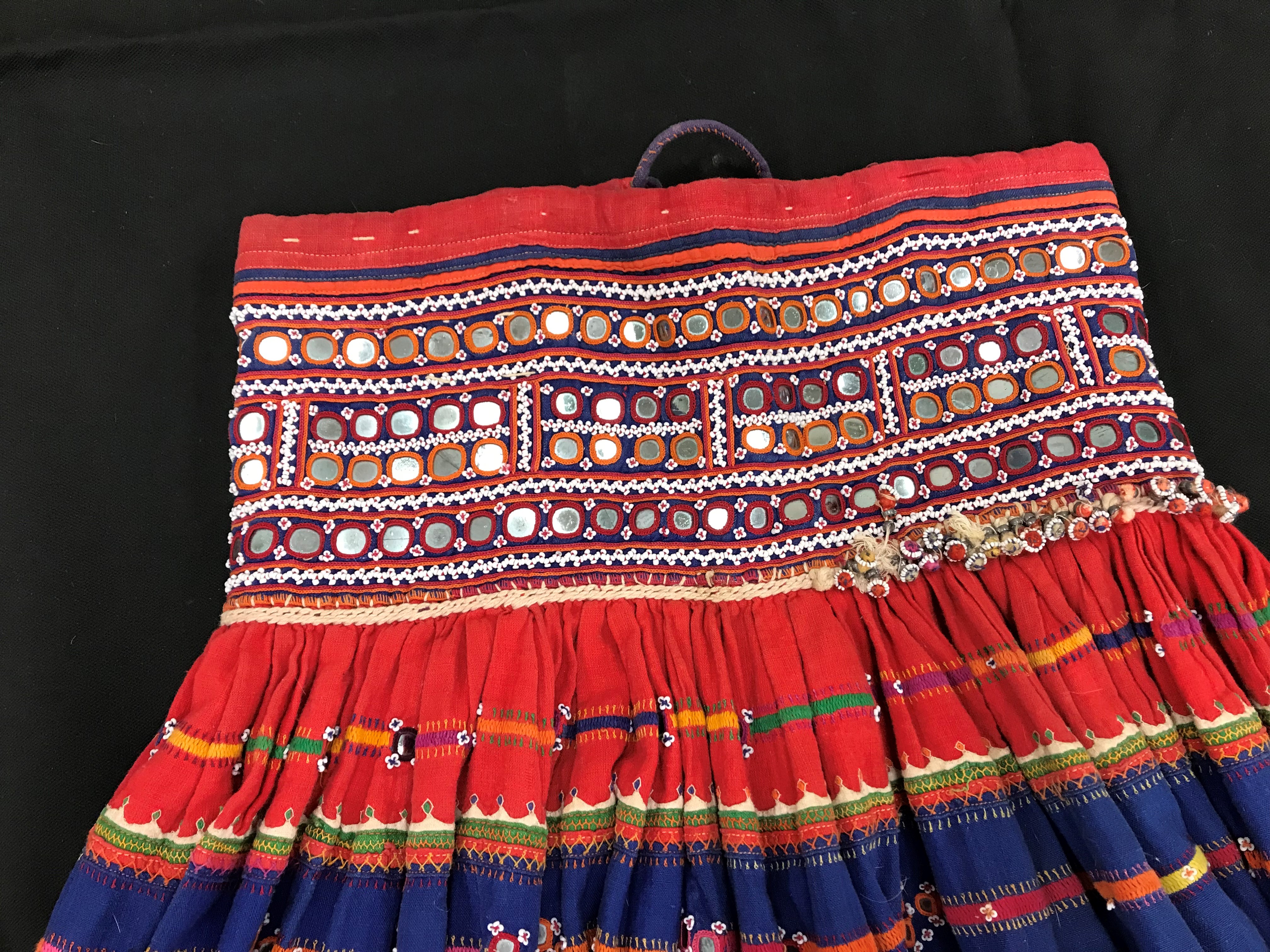 A Rajhistani skirt in red and blue stripes with overlaid embroidery and mirrored decorations, - Image 2 of 14