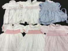 A collection of baby's and childrens' clothes,
