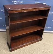A modern mahogany open bookcase with adjustable shelving on a plinth base 100 cm wide x 30 cm deep