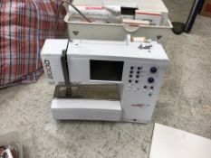 A Bernina "Artista" 180 electric sewing and embroidery machine, together with manual,