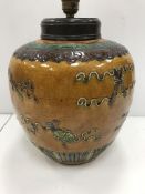 A Chinese pottery polychrome decorated jar and cover,