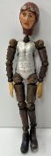 A 1920s Bucherer et Cie Saba jointed figure with male head in flying cap and goggles,