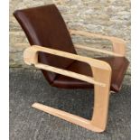 A fine quality contemporary "Airline" chair, birch and ash framed, upholstered in brown leather,