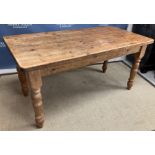 A pine farmhouse kitchen table,