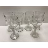 A set of six late 19th Century / early 20th Century engraved glass wines,