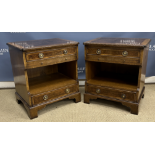 A pair of modern William L McLean mahogany bow fronted chests with brushing slides over three
