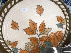 A collection of various china wares to include a Charlotte Rhead "Autumn Leaves" charger, 31.