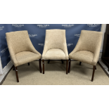 A pair of grey / faun and white upholstered swept arm chairs with mottled decoration,