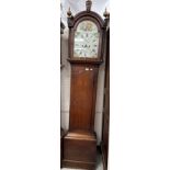 A 19th Century oak cased long case clock, the eight day movement with painted arch dial,