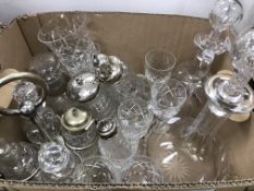 A box of various glassware to include onion shaped decanter and stopper, flagon, two sugar shakers,