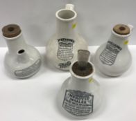 A collection of four pear shaped pottery improved inhalers by S.