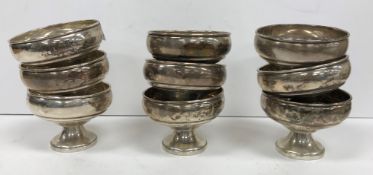 A set of ten Revere sterling silver pedestal bowls stamped to base "Revere Silversmiths Inc