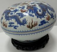 A Chinese circular lidded bowl with all-over five toed dragon and pearl decoration,