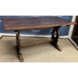 A mid 20th Century oak tavern type refectory style dining table,