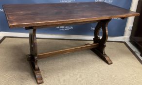 A mid 20th Century oak tavern type refectory style dining table,