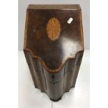 A George III mahogany and inlaid slope top serpentine fronted knife box,