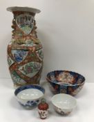 A 19th Century Chinese famille rose vase set with fans variously decorated with floral and bird and
