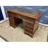 A 20th Century yew wood veneered double pedestal desk,