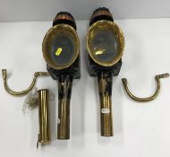 A pair of Victorian brass, copper and black painted coach lamps by Limehouse Co.