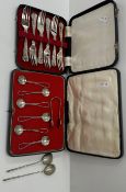 A cased set of six plated coffee spoons with ropework handles,