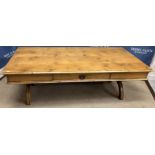 A modern oak dining table in the 17th Century Spanish style,