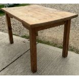 A modern pine farmhouse style kitchen table,