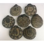 Seven 20th Century Native American sgraffito blackware pottery ocarina type wind instruments