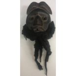 A West African "Dan" mask with real hair beard 23 cm long excluding hair and a Native American