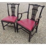 A set of twelve 19th Century mahogany Chippendale style dining chairs with drop in seats on square