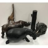 A collection of mainly African carved treen ware animal figures including hippopotamus, elephants,