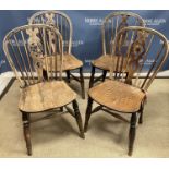 A set of four 19th Century Thames Valley star back beech, ash and elm kitchen chairs,