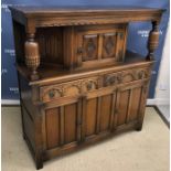 A 20th Century oak court cupboard in the 17th Century style,
