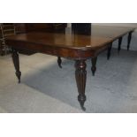 A 19th Century mahogany rectangular dining table by Gillow,