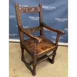 A 17th Century French walnut Wainscott type chair,