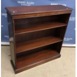 A modern mahogany open bookcase with adjustable shelving on a plinth base 100 cm wide x 30 cm deep