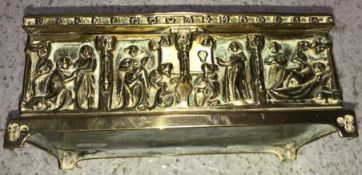 A circa 1900 German brass casket in the medieval manner with high relief decoration of religious