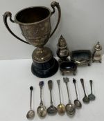 A collection of silver wares to include a twin-handled trophy cup inscribed "Newton Tony Gymkhana