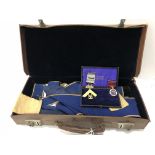 A cased collection of Masonic regalia including a 9 carat gold medal as a ruler and labelled