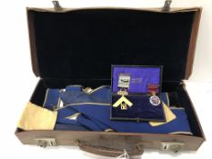 A cased collection of Masonic regalia including a 9 carat gold medal as a ruler and labelled
