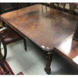 A Victorian mahogany dining table,