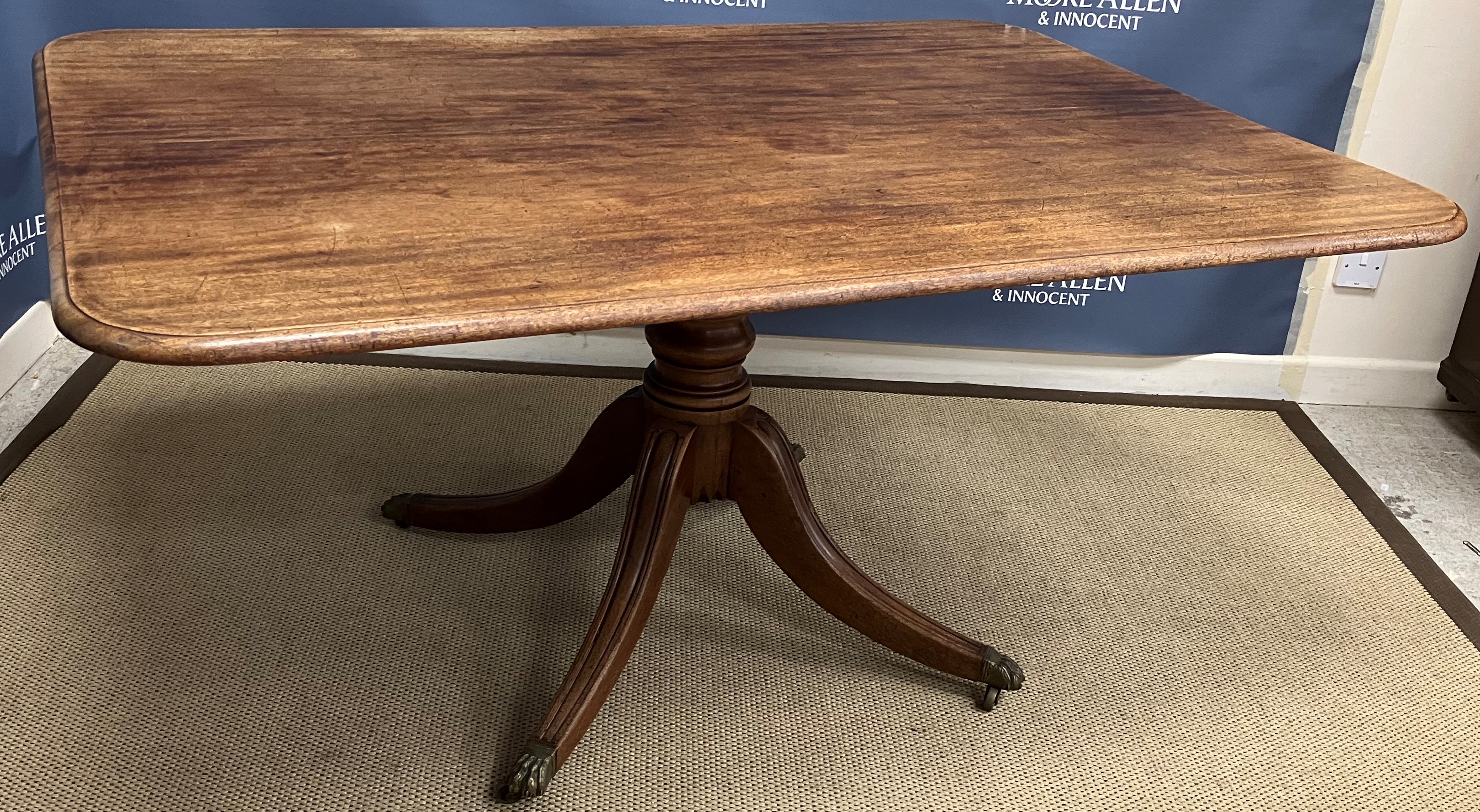 An early 19th Century mahogany breakfast table,