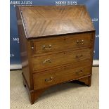 An Edwardian mahogany bureau,