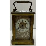 A circa 1900 French lacquered brass cased carriage clock,