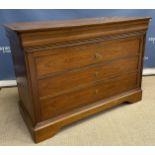 A walnut chest of three long drawers in the Continental manner 99.5 cm wide x 50 cm deep x 72.