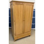 A Heals "Brunel" oak wardrobe,