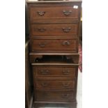 A pair of mahogany bedside chests of three drawers in the Georgian style 52.