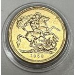 A yellow metal coin as an Elizabeth II sovereign 1958 7.