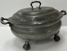 An oval pewter tureen and cover,