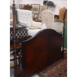 A pair of modern stained wooden headboards in the 19th Century French manner,