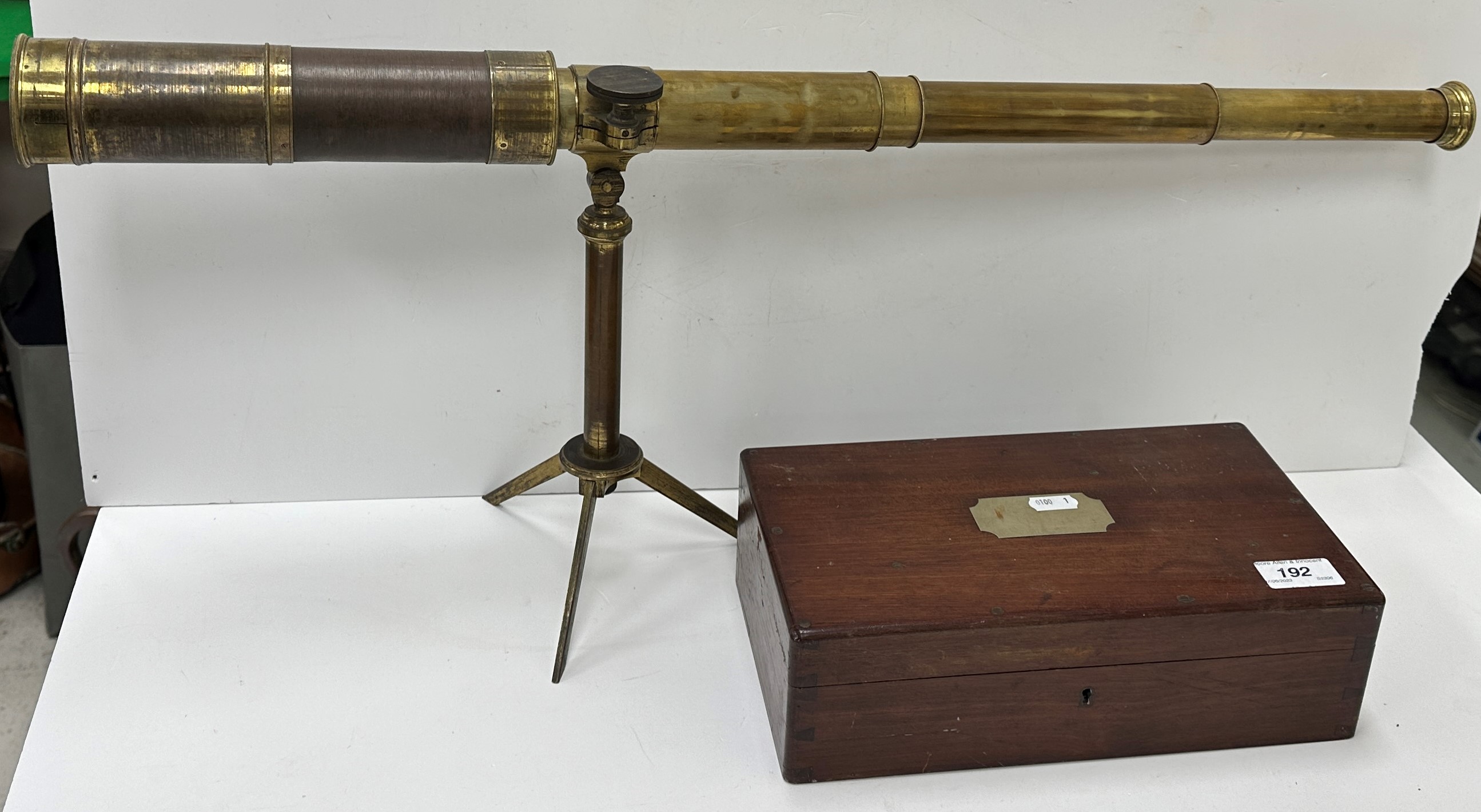 A 19th Century Negretti & Zambra of London brass cased five draw telescope on folding tripod stand,